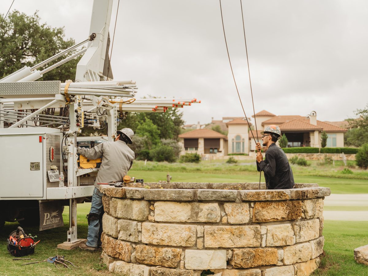 Building a stone-clad wellhead enclosure