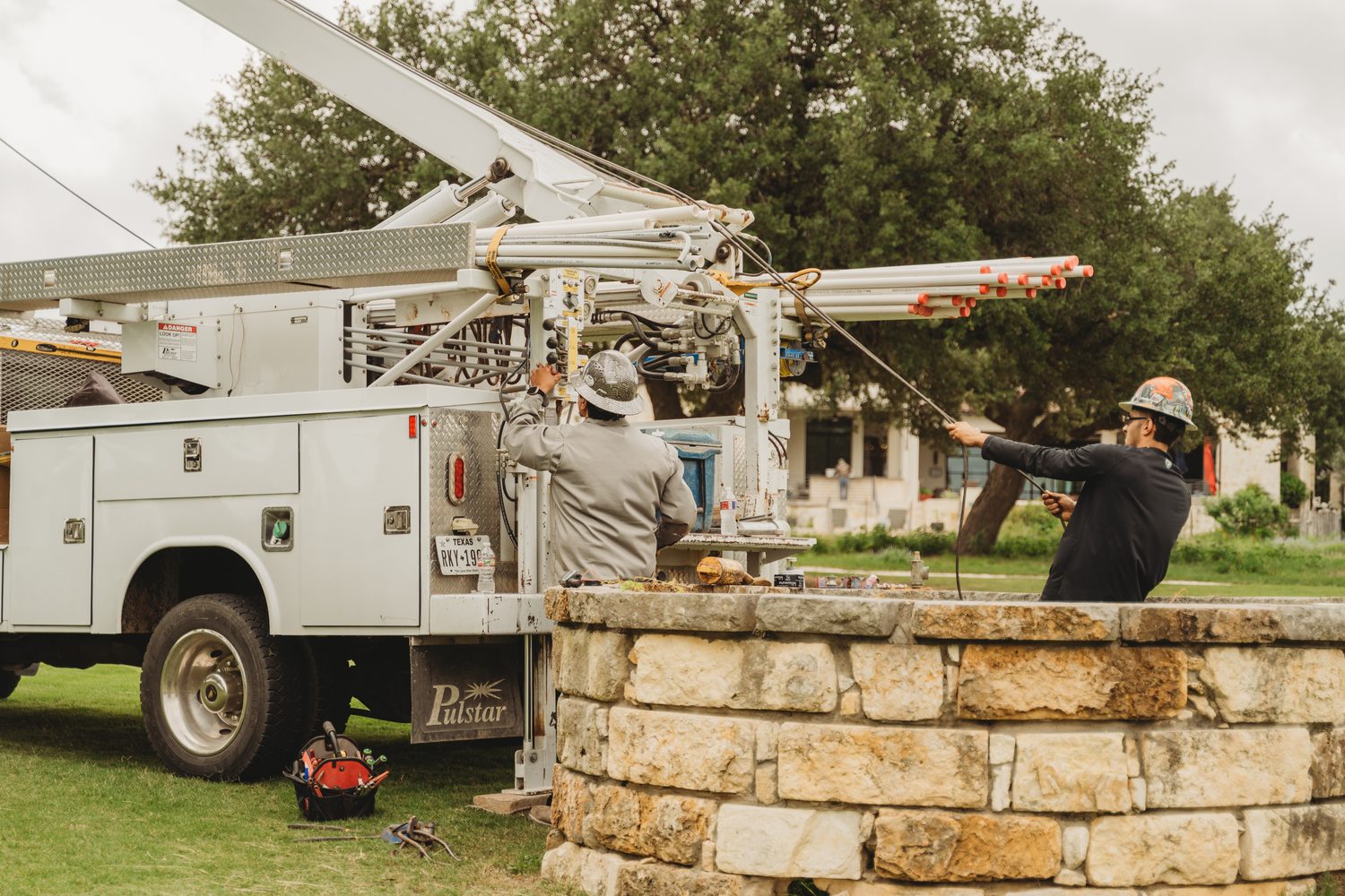 Stone-clad wellhead built by TR Drilling on a Hill Country property